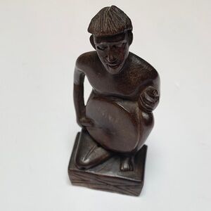 Artisan Carved Wooden Figurine. Size: 4.5x2.